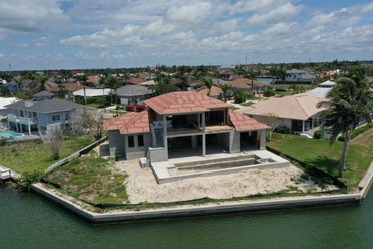 Rear aerial on the canal showing the dried-in shell and pool shell