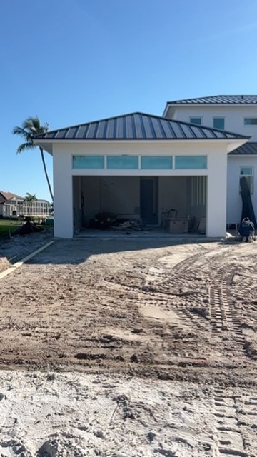 Garage with metal roof under construction